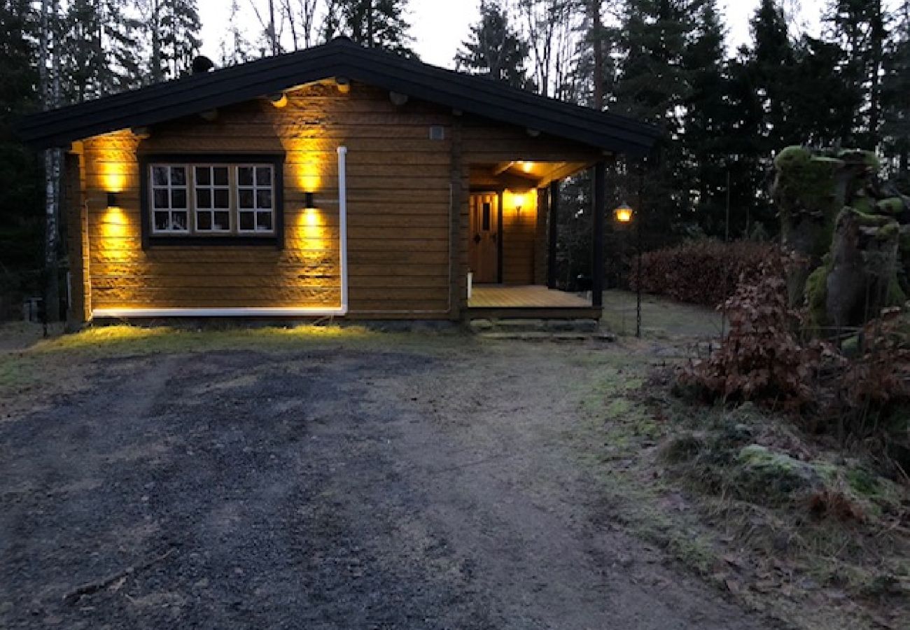 Ferienhaus in Lidhult - Schöne Ferienhaus-Blockhütte zwischen den See Bolmen und Unnen mit eigenem Boot