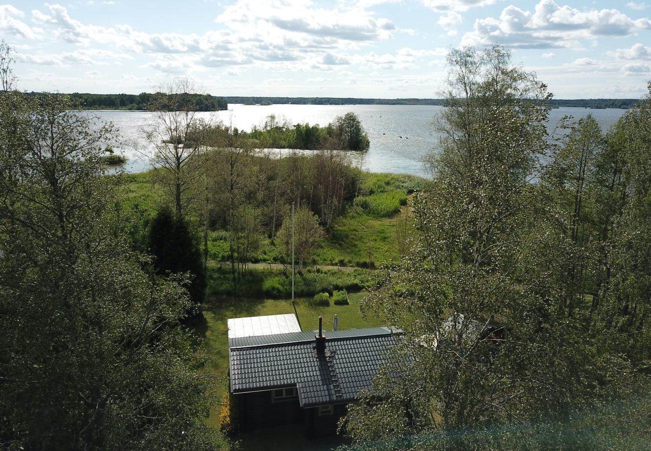 House in Köping - Cozy holiday home by the lake with its own boat