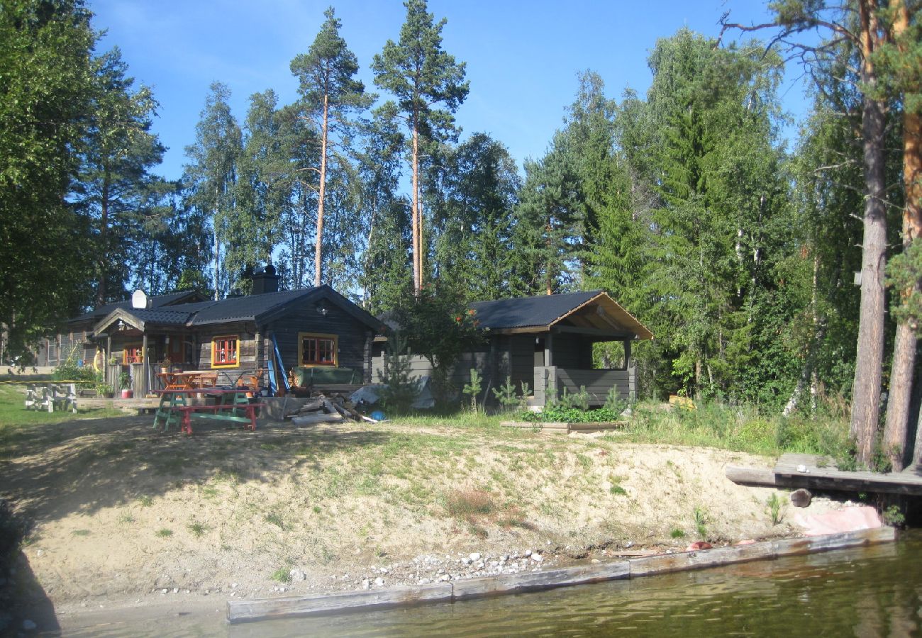 House in Liden - Log cabin right on the lake with boat