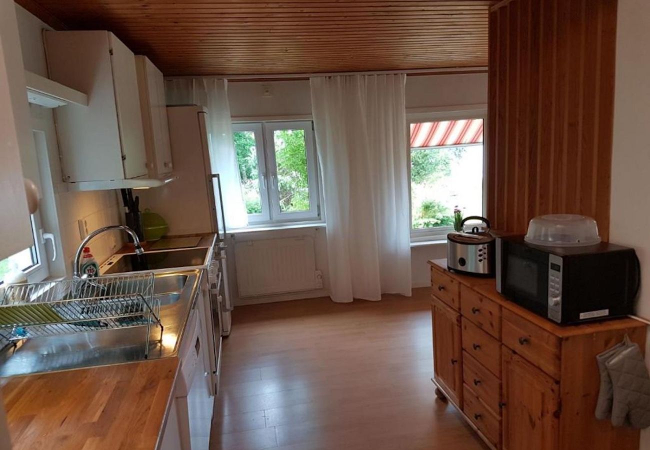 House in Tävelsås - Comfort holiday home right on the lake with its own bathing area and boat